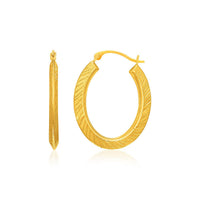 Thumbnail for 10k Yellow Gold Oval Line Texture Hoop Earrings Earrings Angelucci Jewelry   