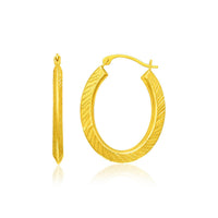 Thumbnail for 14k Yellow Gold Oval Line Texture Hoop Earrings Earrings Angelucci Jewelry   